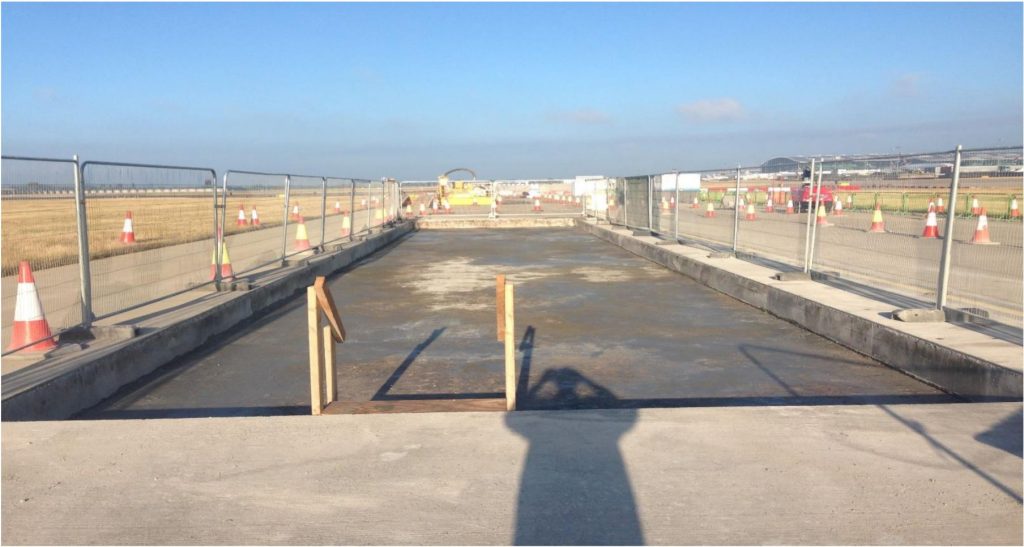 Fenced work area for a taxiway slab replacement at Heathrow