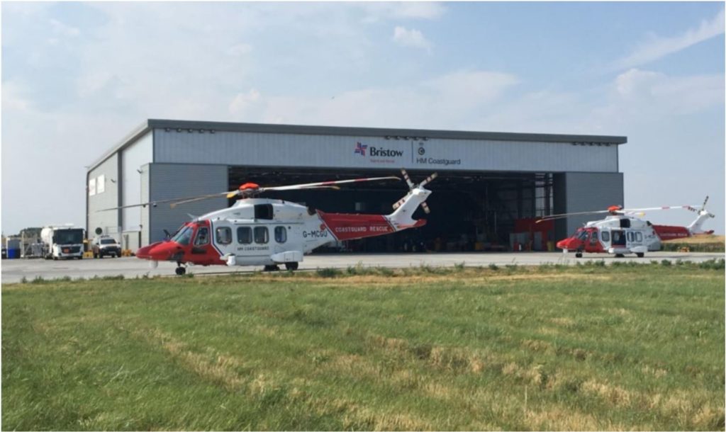 HM Coastguard search and rescue helicopters outside the new hangar at Lydd Airport