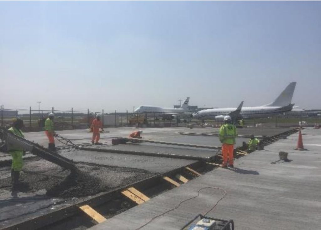 Concrete pour in progress on an aircraft stand at Stansted Airport