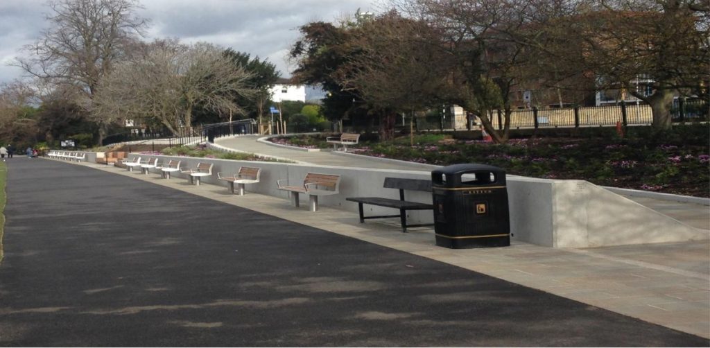 New riverside walkway with benches at the Kingston Riverside leisure development