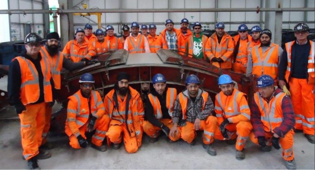 TAG workforce with the last tunnel segment cast for Crossrail