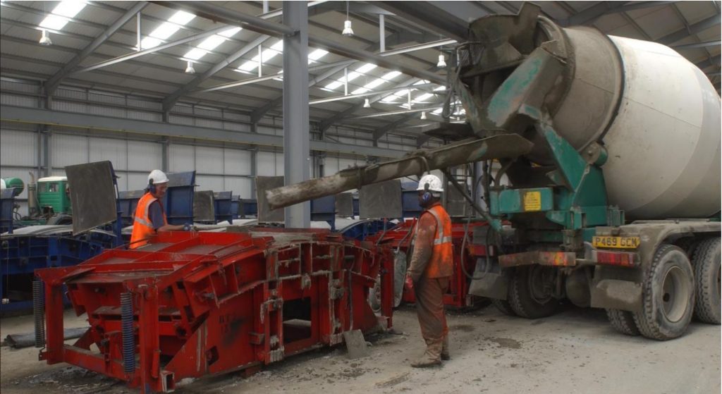 Concrete mixer filling segment moulds for the Channel Tunnel Rail Link
