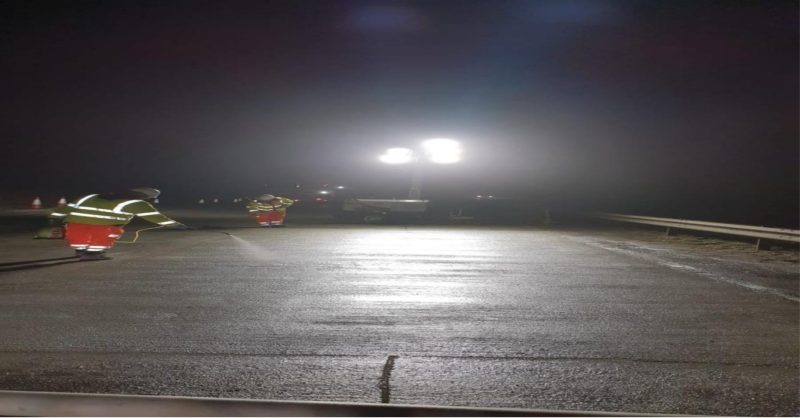 Freshly laid concrete bays lit up at night on the A11 near Wymondham