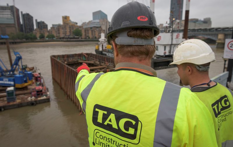 TAG supervisors overlooking the Thames cofferdam at Baynards House